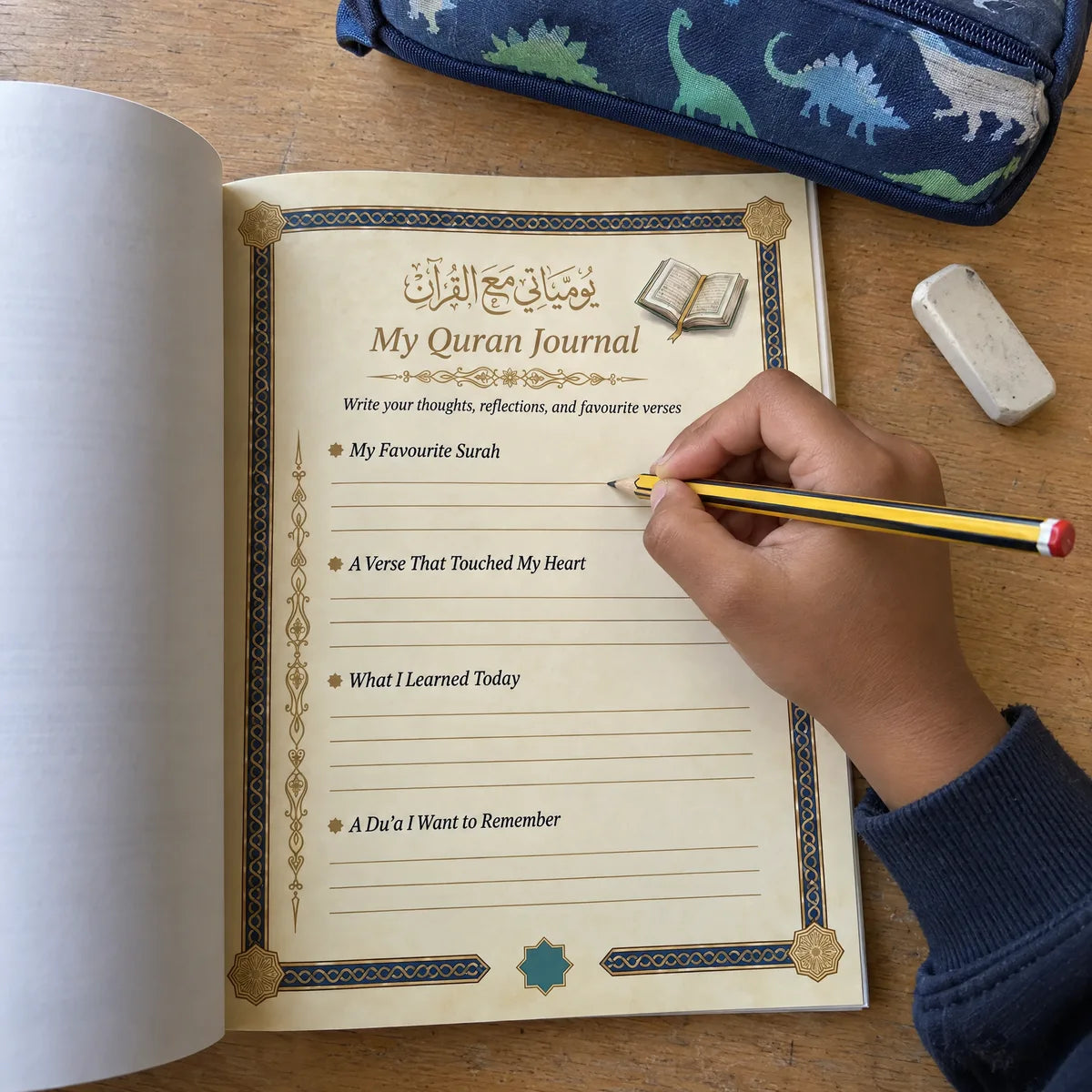 A child writing in the journal pages of the book